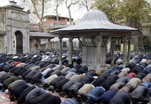 Worshippers offer prayers to mark the Islamic feast of sacrifice outside the Eyup Sultan mosque in Istanbul, Turkey, Monday, Dec. 8, 2008