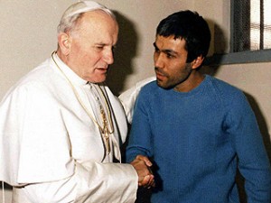 Feb. 27, 1983, Pope John Paul II talks with Mehmet Ali Agca in a Rome prison.